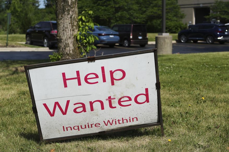 A "Help Wanted" sign is displayed at Illinois Air Team Test Station Saturday, June 21, 2025, in Lincolnshire, Ill. (AP Photo/Nam Y. Huh) ** FILE **