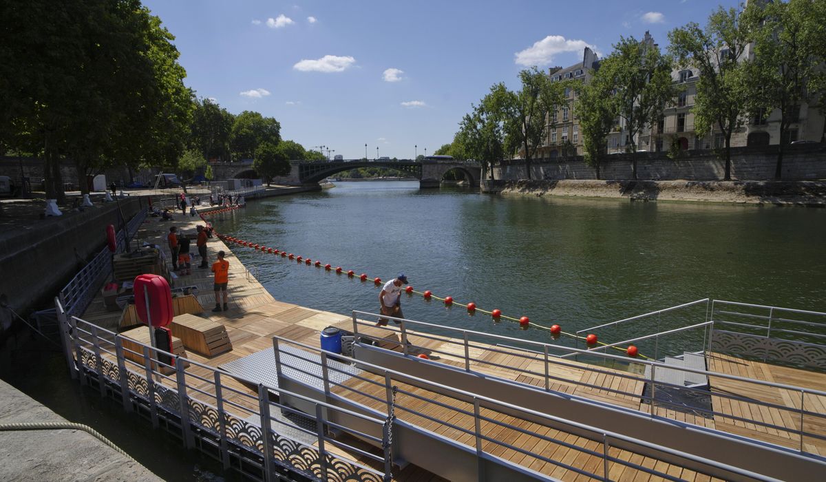 NextImg:Want to take a dip in Paris? River Seine reopens to public swimming for first time in a century