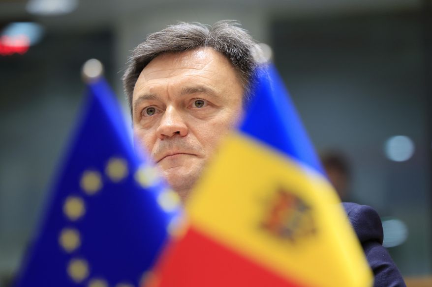 Moldova's Prime Minister Dorin Recean waits for the start of the EU-Moldova Association Council at the European Council building in Brussels, on May 21, 2024. (AP Photo/Geert Vanden Wijngaert, File)