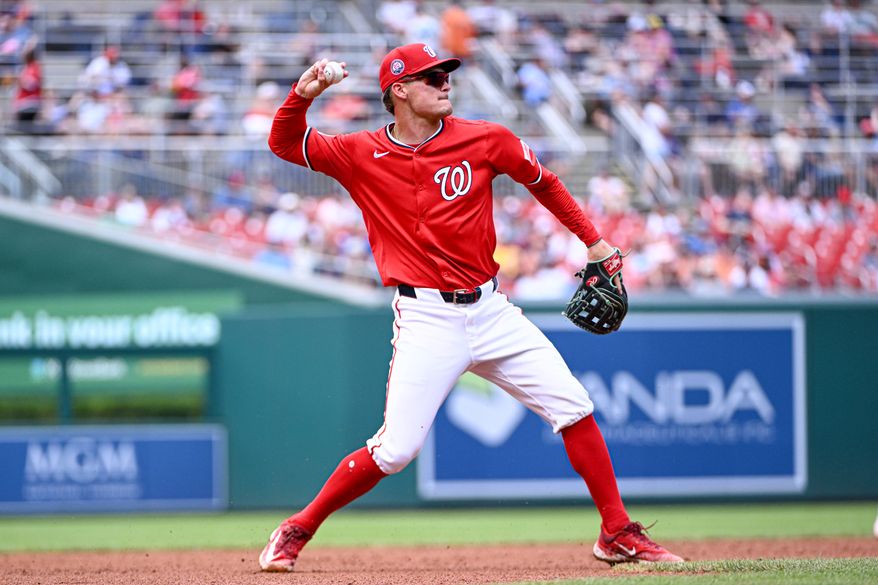 Washington Nationals third baseman Brady House (55) making the throw to first after fielding a ground ball off the bat of Boston Red Sox designated hitter Rob Refsnyder (30) during the fifth inning of an MLB game at Nationals Park in Washington D.C., July 6, 2025. (Photo by All-Pro Reels for Washington Times Sports)