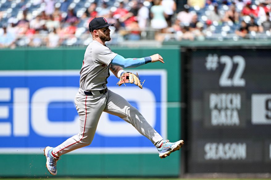 Boston Red Sox shortstop Trevor Story (10) makes the throw to first after fielding a ground ball off the bat of Washington Nationals centerfielder Jacob Young (30) during the sixth inning of an MLB game at Nationals Park in Washington D.C., July 6, 2025. (Photo by All-Pro Reels for Washington Times Sports)