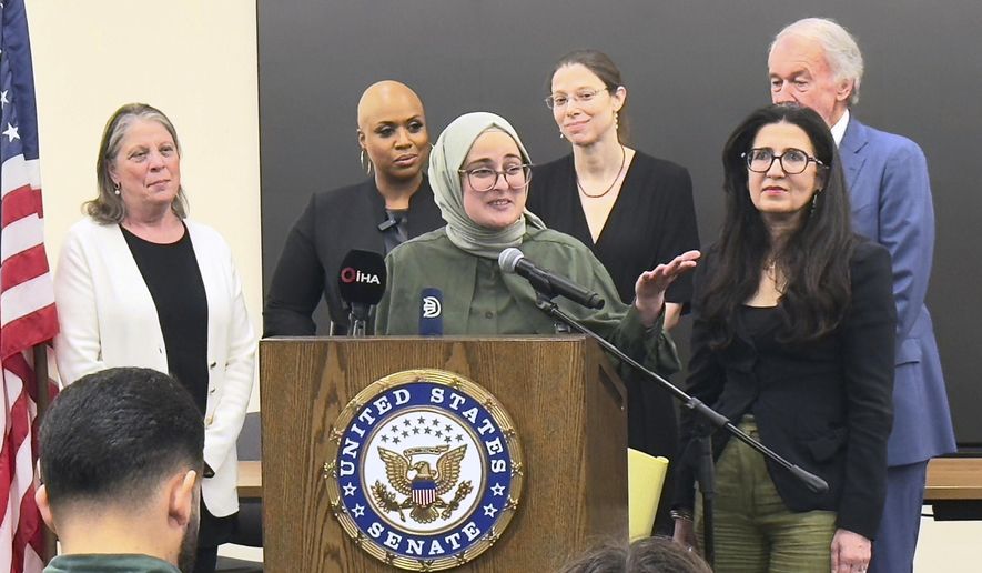 Tufts University student from Turkey, Rumeysa Ozturk, who was arrested by immigration agents while walking along a street in a Boston suburb, talks to reporters on arriving back in Boston, May 10, 2025, a day after she was released from a Louisiana immigration detention center on the orders of a federal judge. (AP Photo/Rodrique Ngowi, File)