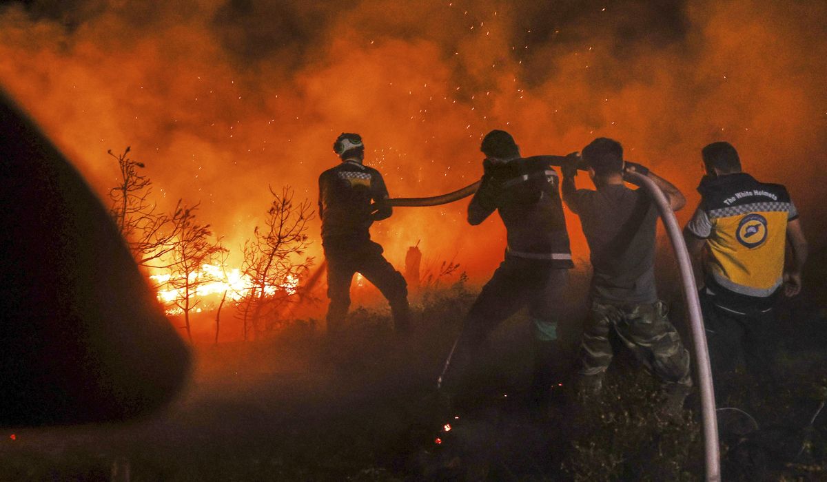 NextImg:Syrian wildfires spread due to heavy winds and war remnants