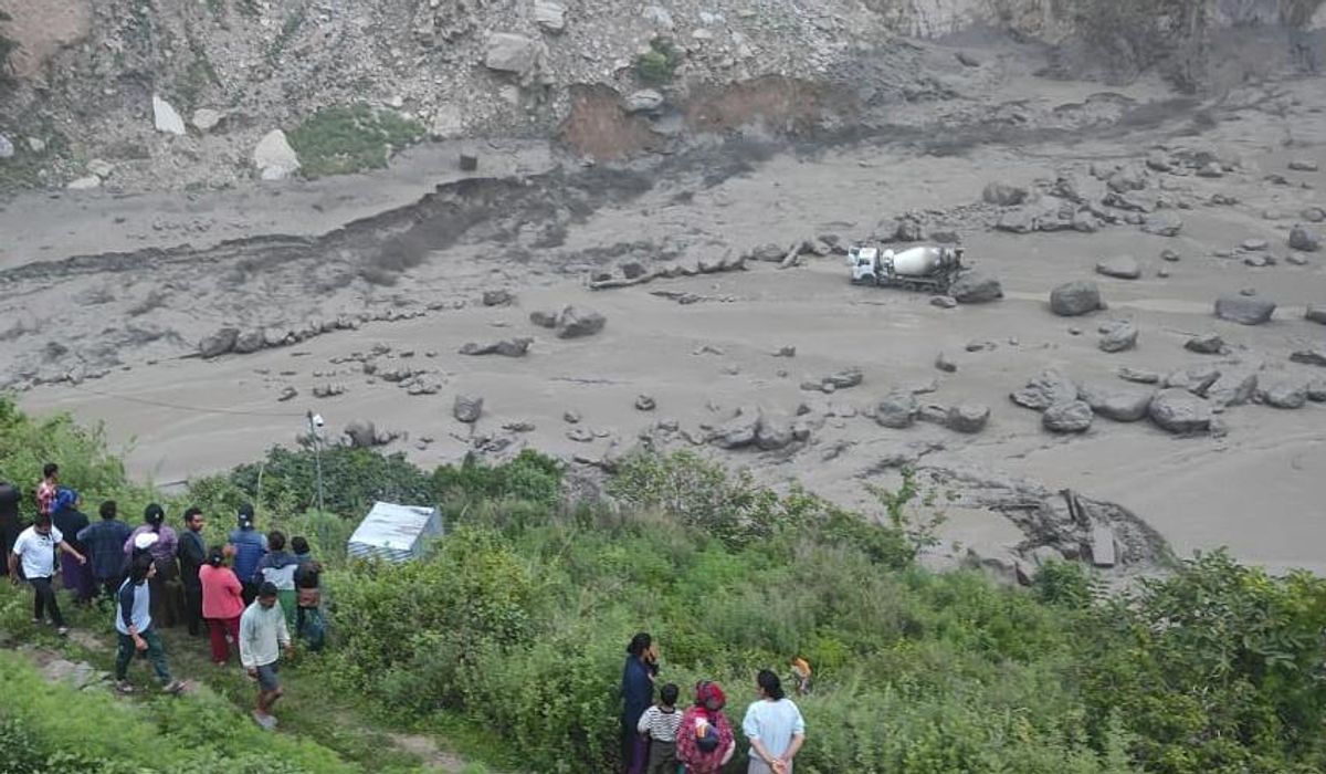 NextImg:Monsoon floods sweep away 20 people and the main bridge linking Nepal to China