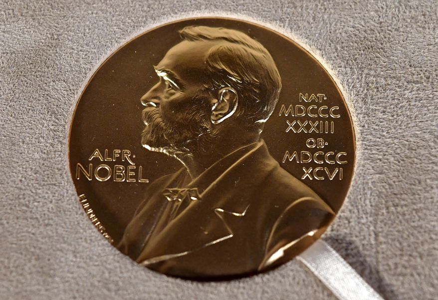 A Nobel medal is displayed during a ceremony in New York on Dec. 8, 2020. (Angela Weiss/Pool Photo via AP, File)