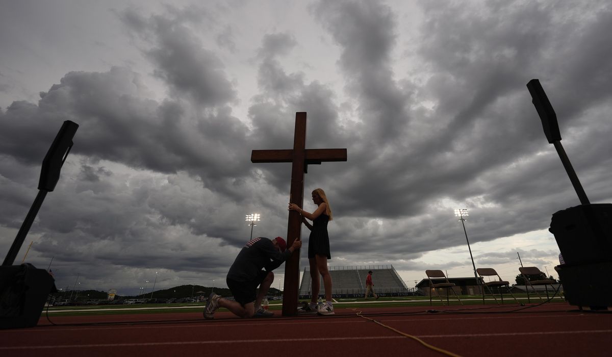 NextImg:Hundreds gather at high school stadium to honor the many lost to deadly Texas floods