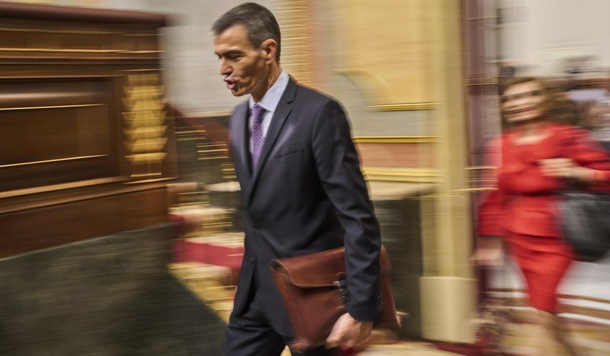 Spanish Prime Minister Pedro Sánchez arrives at the Spanish parliament in Madrid, Wednesday, July 9, 2025. (AP Photo/Bernat Armangue)