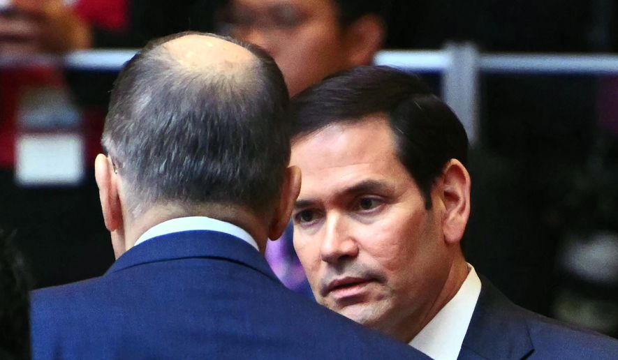 U.S. Secretary of State Marco Rubio, right, talks to Russia's Foreign Minister Sergey Lavrov at the 15th East Asia Summit Foreign Ministers' meeting during the 58th Association of Southeast Asian Nations (ASEAN) Foreign Ministers' meeting and related meetings at the Convention Centre in Kuala Lumpur on Friday, July 11, 2025. (Mandel Ngan/Pool Photo via AP) ** FILE **