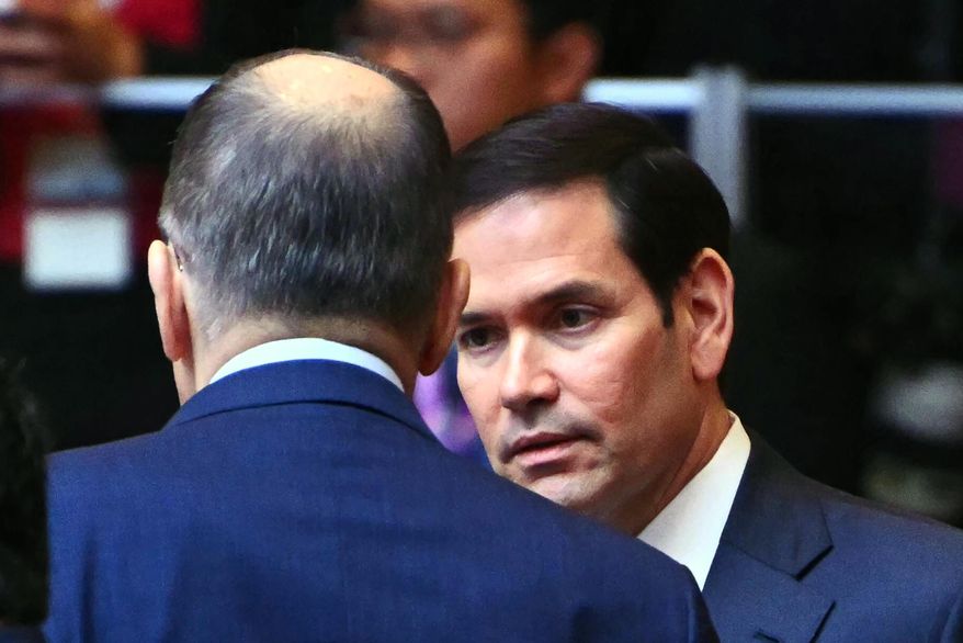 U.S. Secretary of State Marco Rubio, right, talks to Russia's Foreign Minister Sergey Lavrov at the 15th East Asia Summit Foreign Ministers' meeting during the 58th Association of Southeast Asian Nations (ASEAN) Foreign Ministers' meeting and related meetings at the Convention Centre in Kuala Lumpur on Friday, July 11, 2025. (Mandel Ngan/Pool Photo via AP) ** FILE **