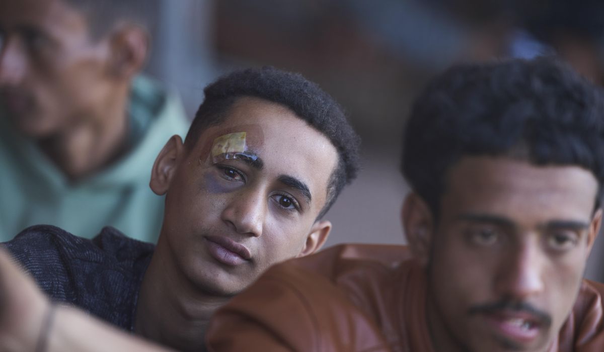 NextImg:Hundreds of migrants moved from Crete to Greek mainland as island struggles with Libya arrivals