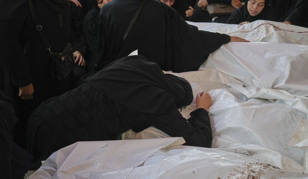 NextImg:52 Palestinians in Gaza are killed by Israeli airstrikes or shot dead while seeking aid
