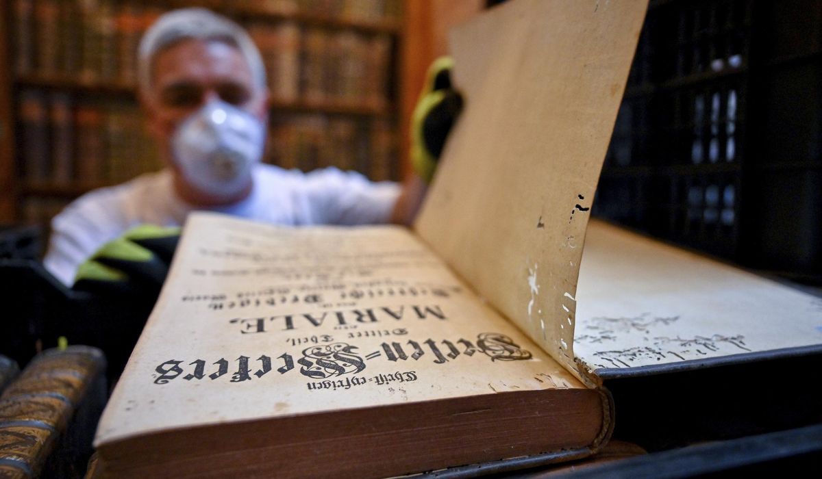 NextImg:Hungary’s oldest library is fighting to save 100,000 books from a beetle infestation