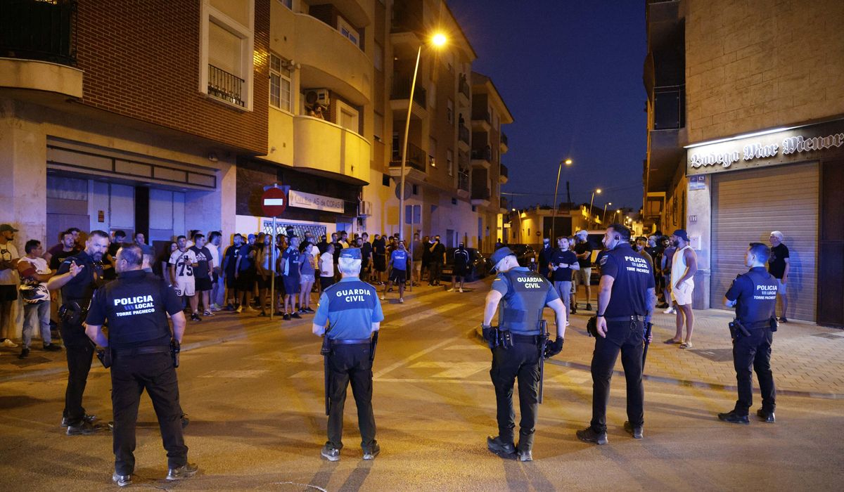NextImg:Police detain 8 people after anti-migrant clashes in Spanish town