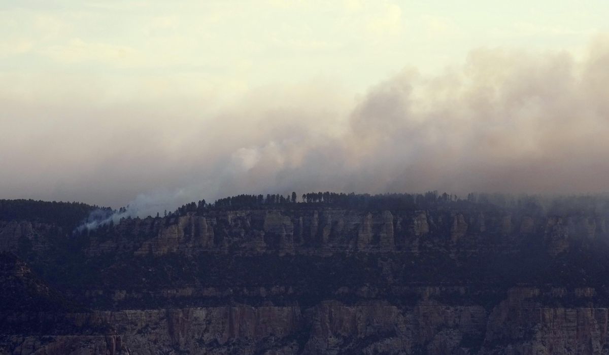 NextImg:A wildfire that destroyed historic Grand Canyon Lodge spread after being allowed to burn for days