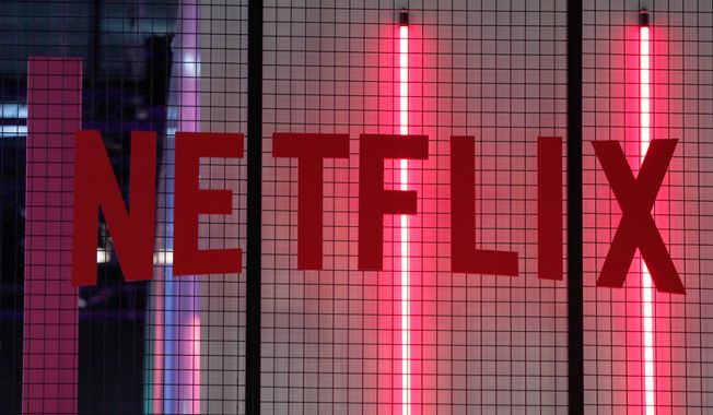 In this Nov. 4, 2017, file photo, the logo of entertainment company Netflix is pictured in Paris. (AP Photo/Christophe Ena, File)