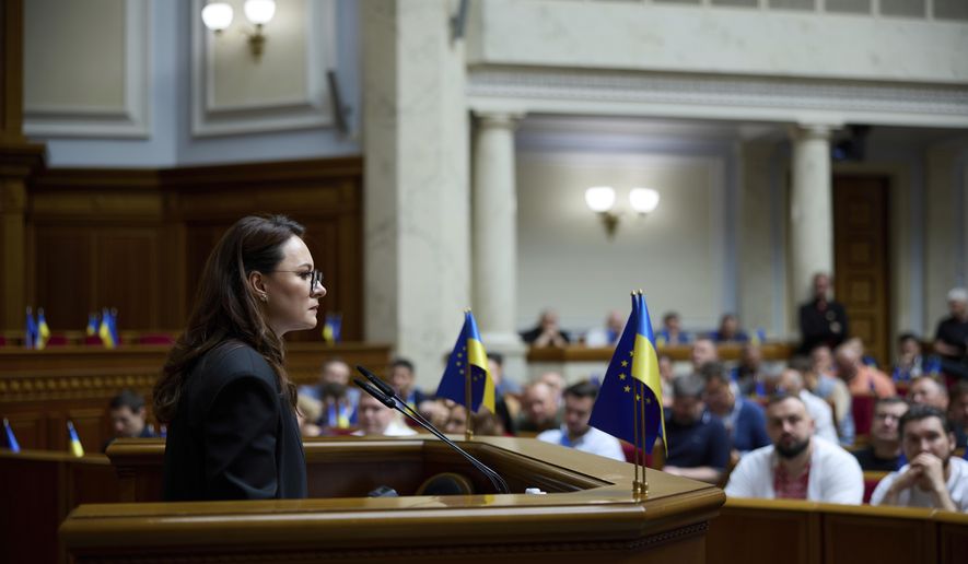 Ukraine's newly elected Prime Minister Yulia Svyrydenko speaks at the parliament session hall in Kyiv, Ukraine Thursday, July 17, 2025. (AP Photo/Vadym Sarakhan)