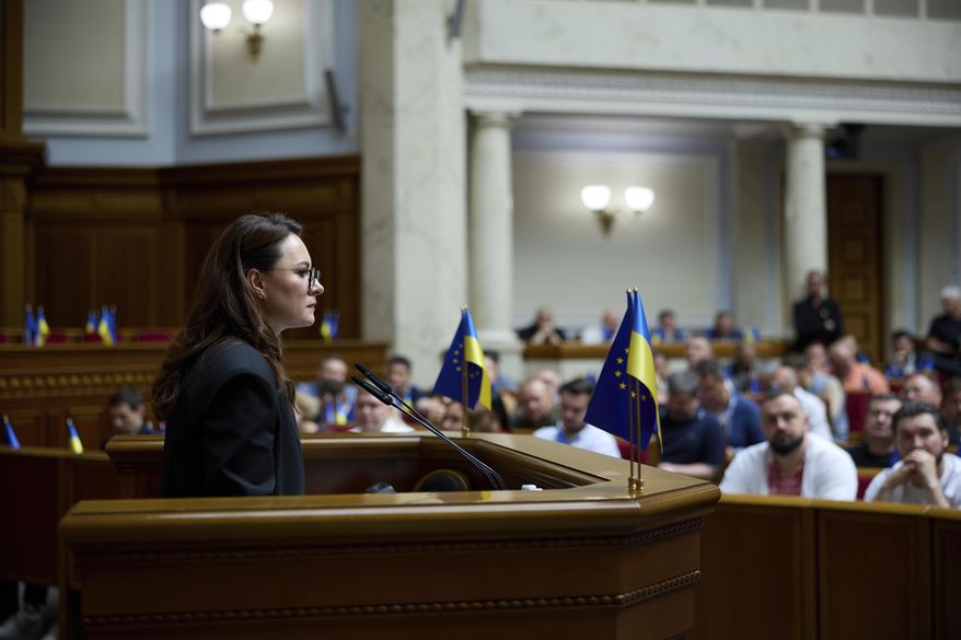 Ukraine's newly elected Prime Minister Yulia Svyrydenko speaks at the parliament session hall in Kyiv, Ukraine Thursday, July 17, 2025. (AP Photo/Vadym Sarakhan)