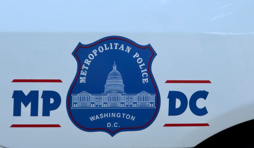 Metropolitan Police Department's MP DC decal emblem badge shown on a police vehicle. File photo credit: DCStockPhotography via Shutterstock.