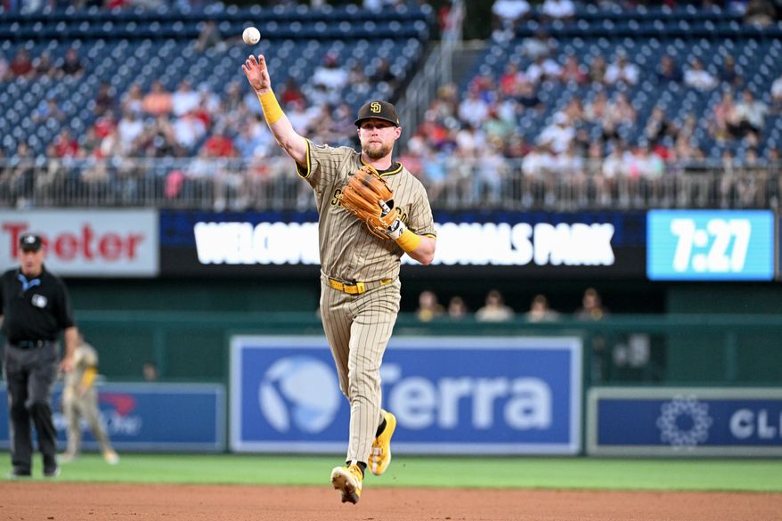 San Diego Padres second baseman Jake Cronenworth (9) making the throw to first after fielding a ground ball off the bat of Washington Nationals centerfielder Jacob Young (30) during the third inning of an MLB game at Nationals Park in Washington D.C., July 18, 2025. (Photo by All-Pro Reels for Washington Times Sports)