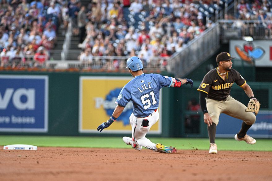 Washington Nationals right fielder Daylen Lile (51) sliding into second after hitting a double during the second inning of an MLB game against the San Diego Padres at Nationals Park in Washington D.C., July 19, 2025. (Photo by All-Pro Reels for Washington Times Sports)