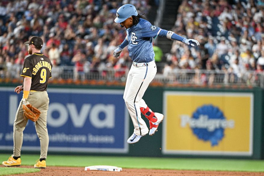 Washington Nationals shortstop C.J. Abrams (5) jumping up onto second base after hitting a double during the third inning of an MLB game against the San Diego Padres at Nationals Park in Washington D.C., July 19, 2025. (Photo by All-Pro Reels for Washington Times Sports)