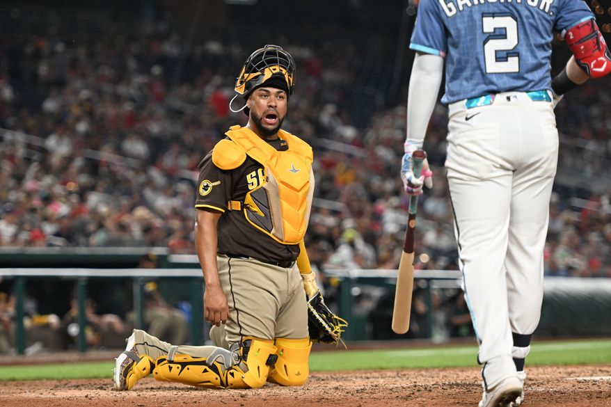 San Diego Padres catcher Elias Diaz (17) talking with Washington Nationals second baseman Luis Garcia (2) during the eighth inning of an MLB game at Nationals Park in Washington D.C., July 19, 2025. (Photo by All-Pro Reels for Washington Times Sports)