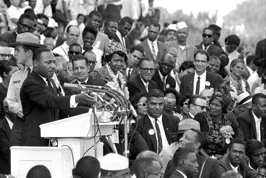 FILE - Martin Luther King Jr., head of the Southern Christian Leadership Conference, speaks to thousands during his "I Have a Dream" speech at the Lincoln Memorial during the March on Washington for Jobs and Freedom, Aug. 28, 1963, in Washington. (AP Photo/File)