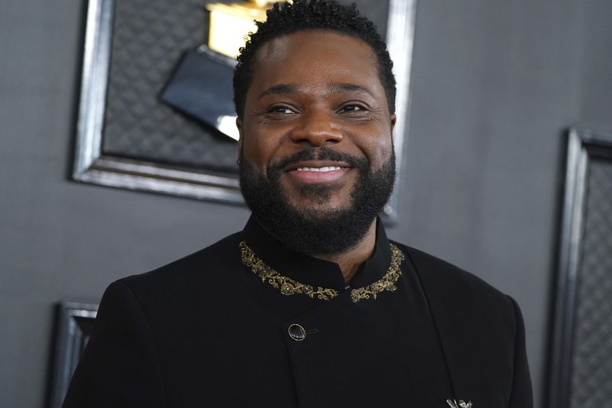 Malcolm-Jamal Warner arrives at the 65th annual Grammy Awards, Feb. 5, 2023, in Los Angeles. (Photo by Jordan Strauss/Invision/AP, File)