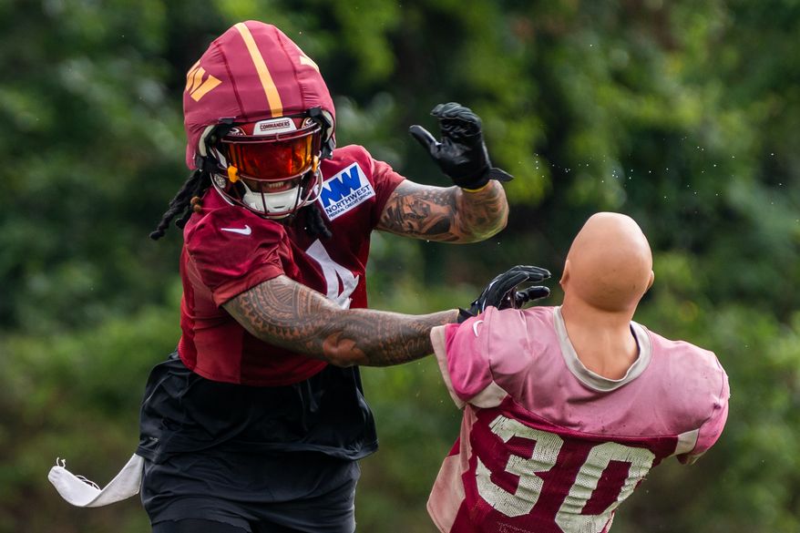 Washington Commanders Line Backer Frankie Luvu (4) powers through drills at Commanders training camp at the OrthoVirginia Training Center in Ashburn, Virginia, July 23rd, 2025. (Photo by Jordan Sabillo for Washington Times)