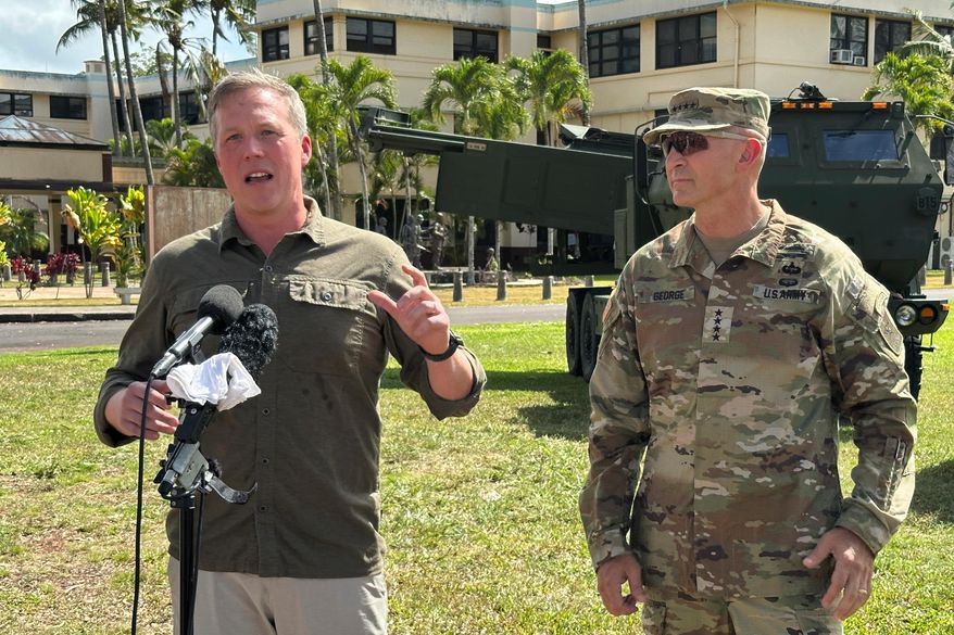 U.S. Army Secretary Daniel P. Driscoll, left, speaks to journalists while standing next to Army Chief of Staff Gen. Randy A. George at Schofield Barracks, Hawaii, on Tuesday, July 22, 2025. (AP Photo/Audrey McAvoy) ** FILE **