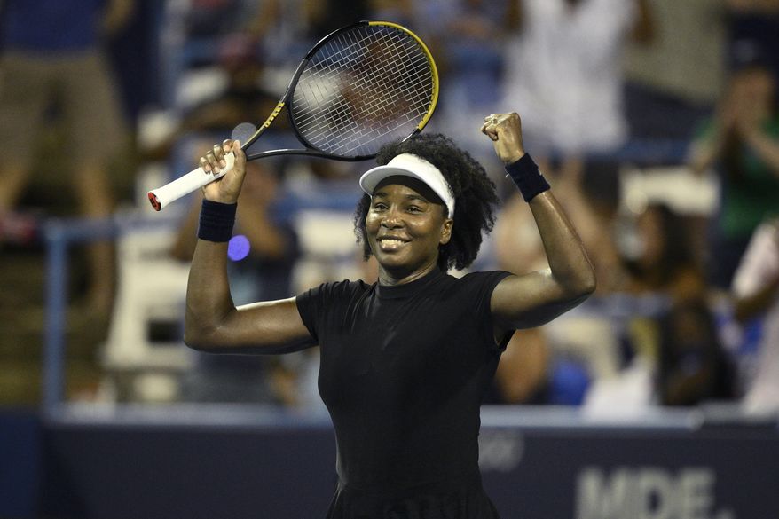 Venus Williams celebrates her win over Peyton Stearns during a match at the Citi Open tennis tournament Tuesday, July 22, 2025, in Washington. (AP Photo/Nick Wass)