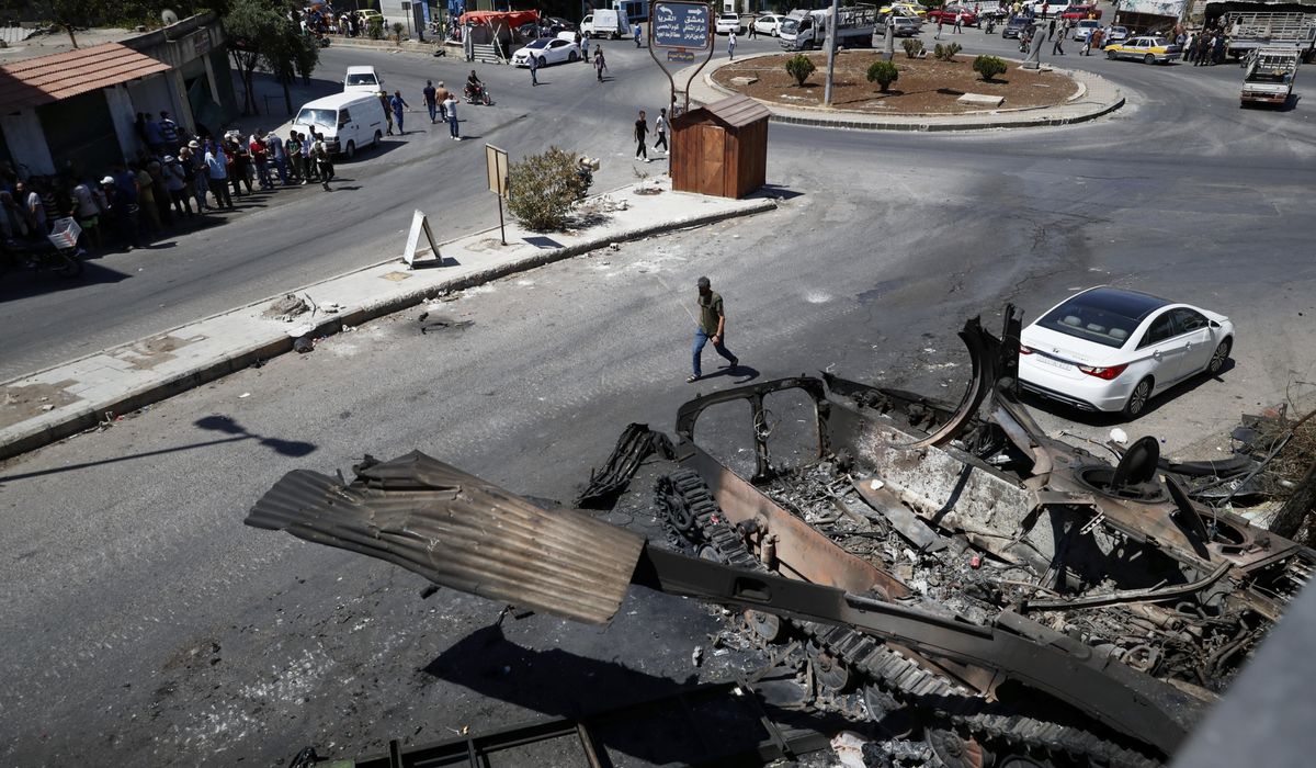 NextImg:In Syria’s Sweida, the stench of death still lingers days after sectarian bloodshed