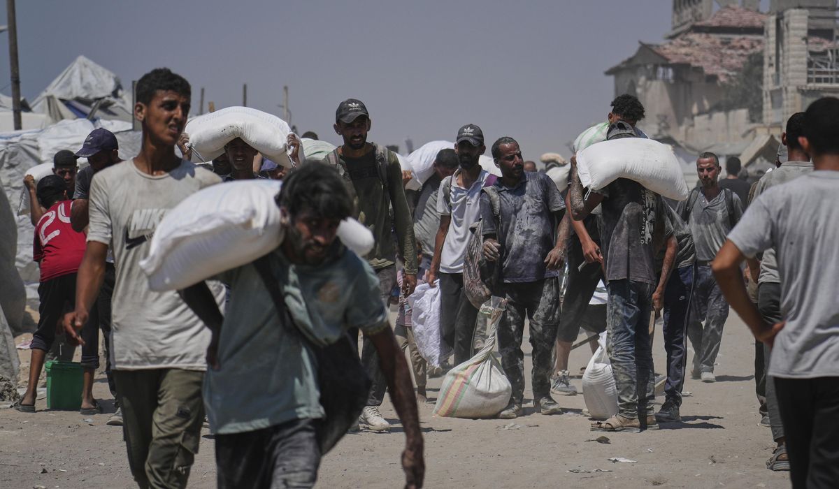 NextImg:Israeli strikes kill at least 36 people in Gaza, officials say, as some aid restrictions are eased