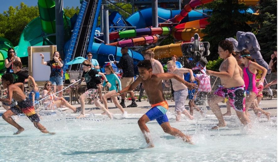 Families race to compete in friendly competition during National Waterpark Day at Kalahari Resort.