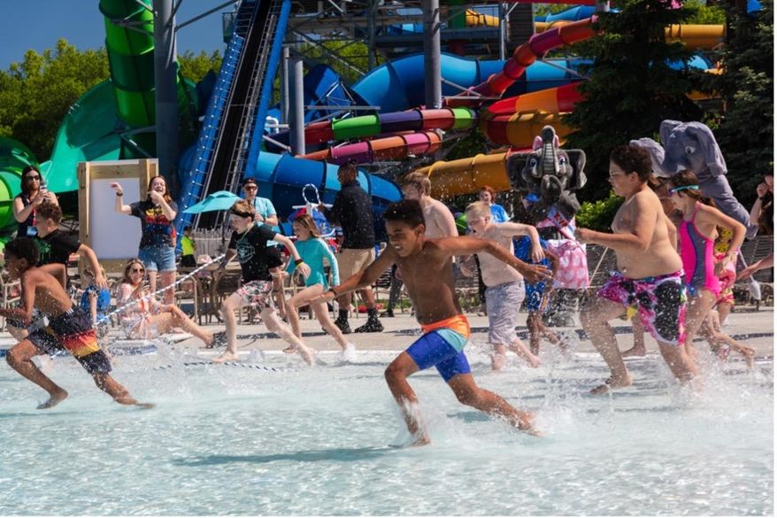 Families race to compete in friendly competition during National Waterpark Day at Kalahari Resort.