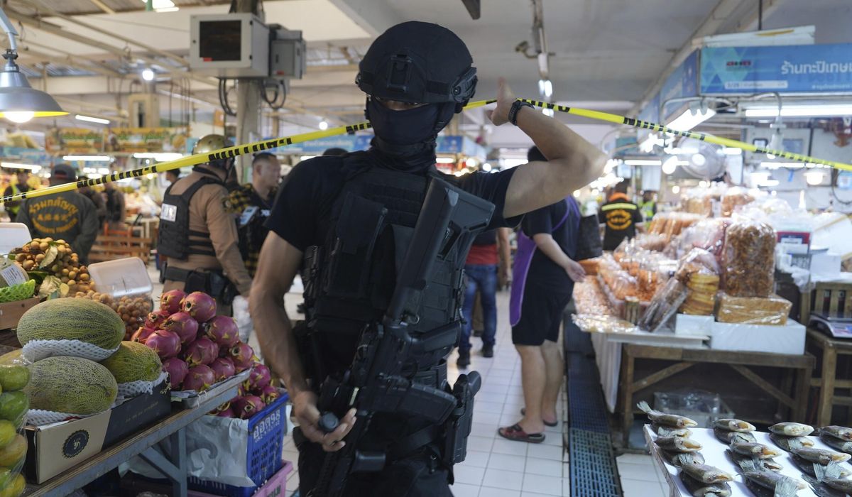 NextImg:Gunman with a grudge kills 5 and wounds 2 at a Bangkok market before killing himself, police say