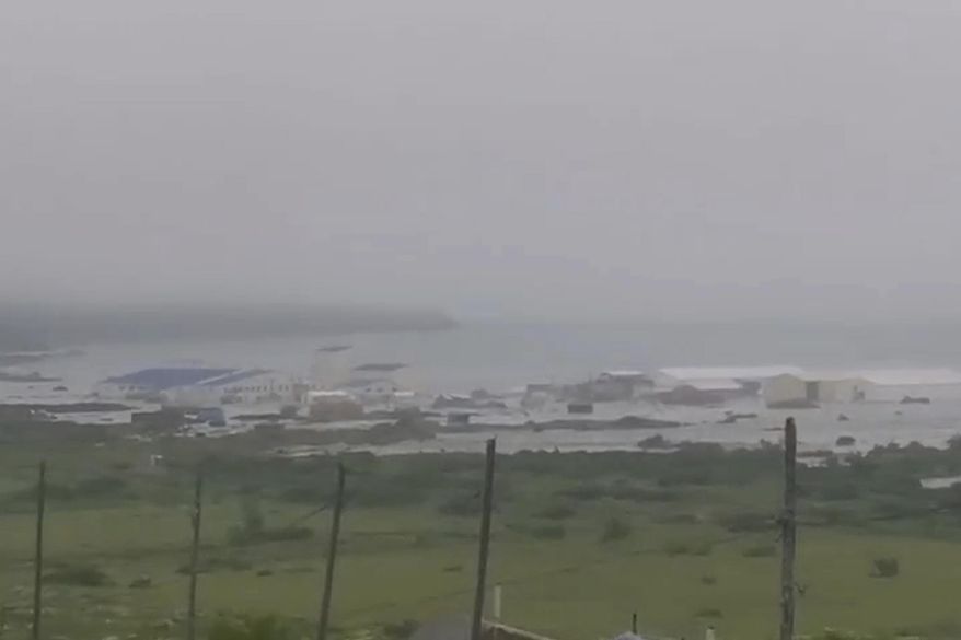 In this image taken from a video released by Geophysical Service of the Russian Academy of Sciences, shows the aftermath of tsunami hitting the coastal area of Severo-Kurilsk at Paramushir island of Kuril Islands, Russia, Wednesday, July 30, 2025. (Geophysical Service of the Russian Academy of Sciences via AP)