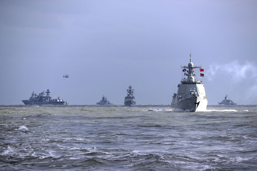 FILE - In this photo released by Xinhua News Agency, Chinese and Russian warships take part in a joint naval drills in the East China Sea, Dec. 27, 2022. (Xu Wei/Xinhua via AP, File)