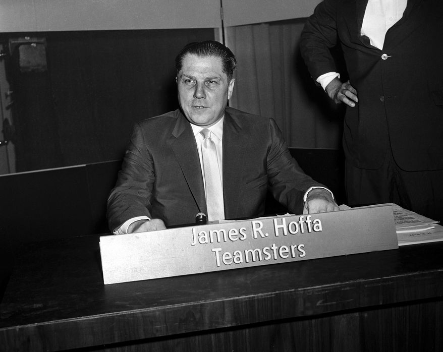 Jimmy Hoffa, president of the Teamsters Union, poses shortly before his appearance on the TV program "Face the Nation" on July 26, 1959, in Washington. (AP Photo) **FILE**