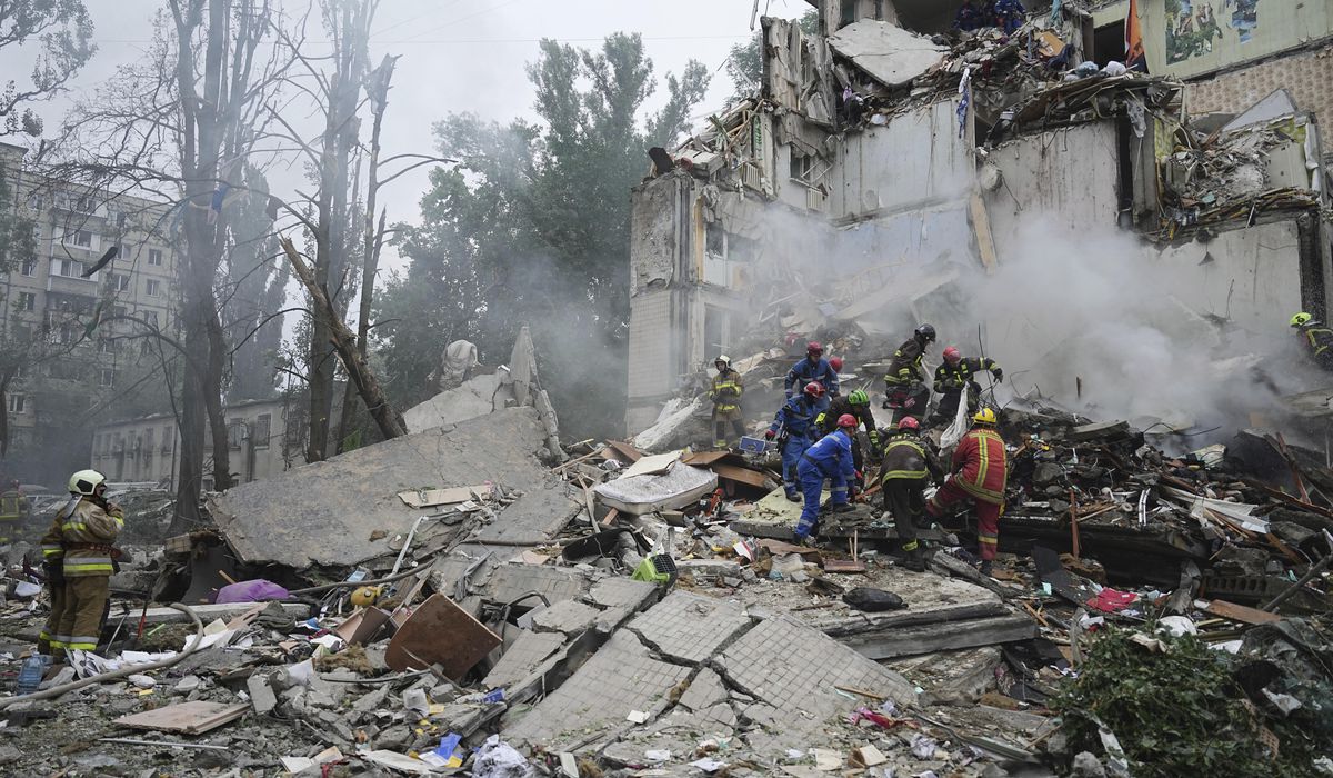 NextImg:Russian missile and drone attack on Kyiv kills at least 13 people and injures more than 130