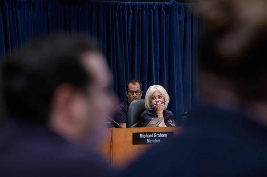 National Transportation Safety Board Chairwoman Jennifer Homendy presides over the NTSB fact-finding hearing on the DCA midair collision accident, at the National Transportation and Safety Board boardroom, Wednesday, July 30, 2025, in Washington. (AP Photo/Rod Lamkey, Jr.)