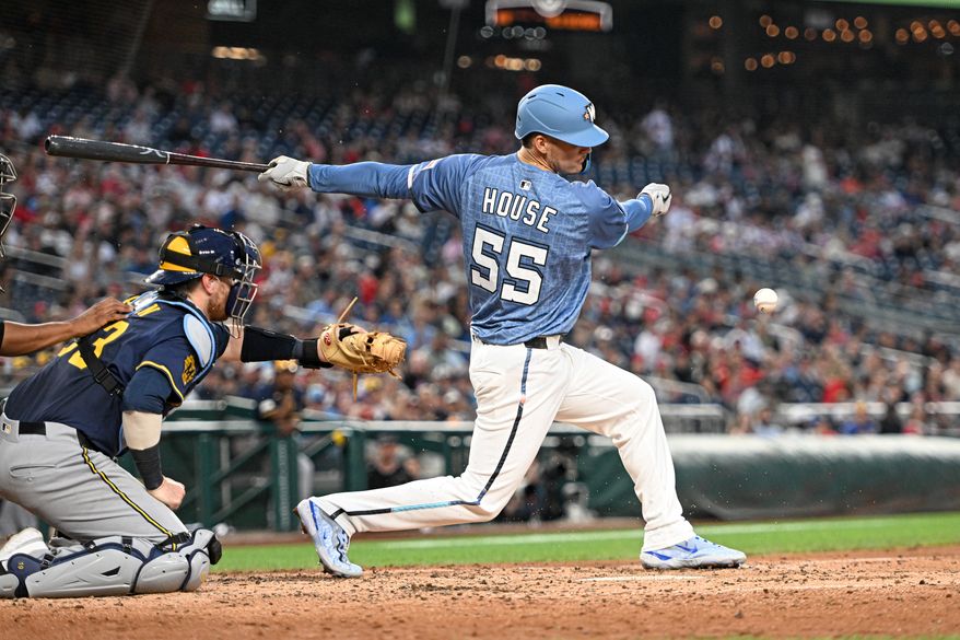 Washington Nationals third baseman Brady House (55) hitting a soft grounder in front of the plate during the fourth inning of an MLB game against the Milwaukee Brewers at Nationals Park in Washington D.C., August 1, 2025. (Photo by All-Pro Reels for Washington Times Sports)