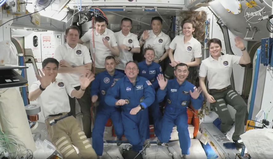 This image made from video provided by NASA and SpaceX shows from right in blue, Japan's Kimiya Yui, NASA's Zena Cardman, NASA's Mike Fincke and Russia's Oleg Platonov, with colleagues up there since March at the International Space Station during a welcome ceremony, Saturday, Aug. 2, 2025. (NASA and SpaceX via AP)