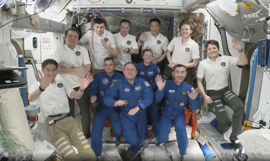 This image made from video provided by NASA and SpaceX shows from right in blue, Japan's Kimiya Yui, NASA's Zena Cardman, NASA's Mike Fincke and Russia's Oleg Platonov, with colleagues up there since March at the International Space Station during a welcome ceremony, Saturday, Aug. 2, 2025. (NASA and SpaceX via AP)