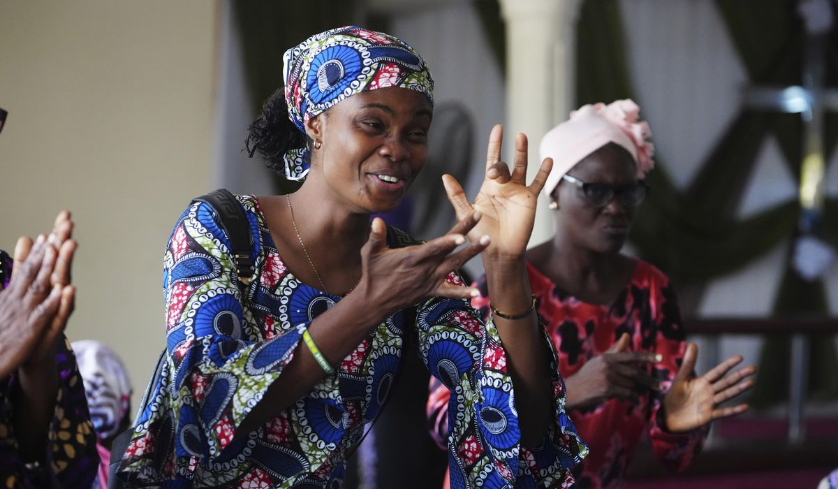 NextImg:‘God understands us’: Inside a Nigerian church where deaf people find faith and community