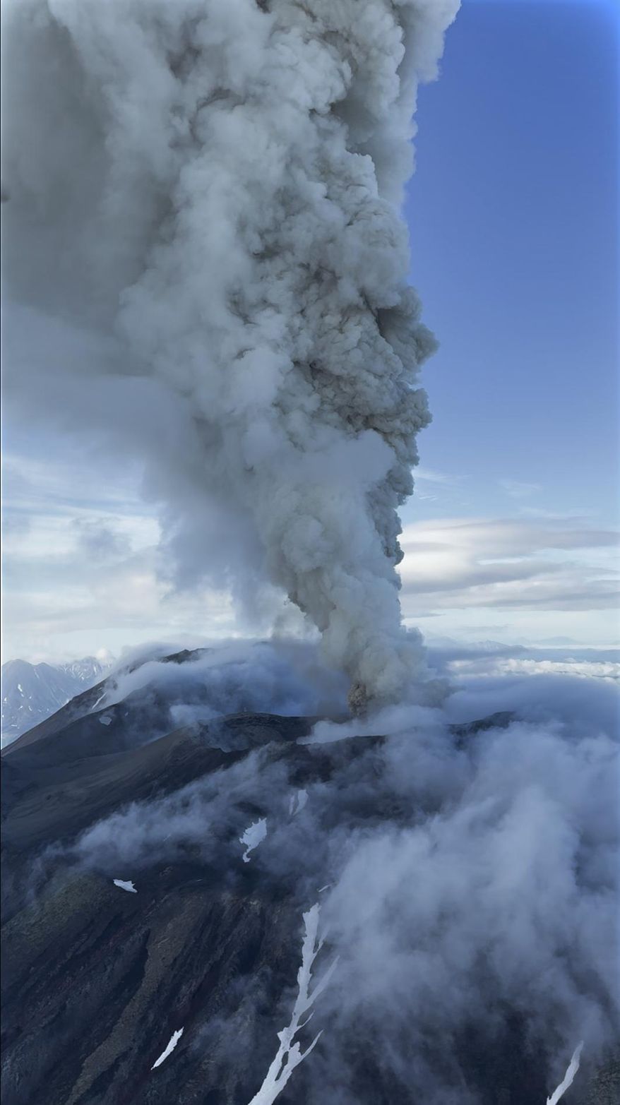 This photo taken from video by Artem Sheldr shows an aerial view of the eruption of the Krasheninnikov volcano of the Eastern volcanic belt, about 200 km (125 miles) northeast of the regional center of Petropavlovsk-Kamchatsky, Russia far east, Sunday, Aug. 3, 2025. (Artem Sheldr via AP)