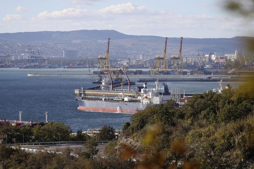 An oil tanker is moored at the Sheskharis complex, part of Chernomortransneft JSC, a subsidiary of Transneft PJSC, in Novorossiysk, Russia, on Oct. 11, 2022, one of the largest facilities for oil and petroleum products in southern Russia. (AP Photo, File)