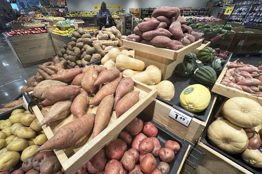 A customer shops at a grocery store in Glenview, Ill., July 15, 2025. (AP Photo/Nam Y. Huh, File)
