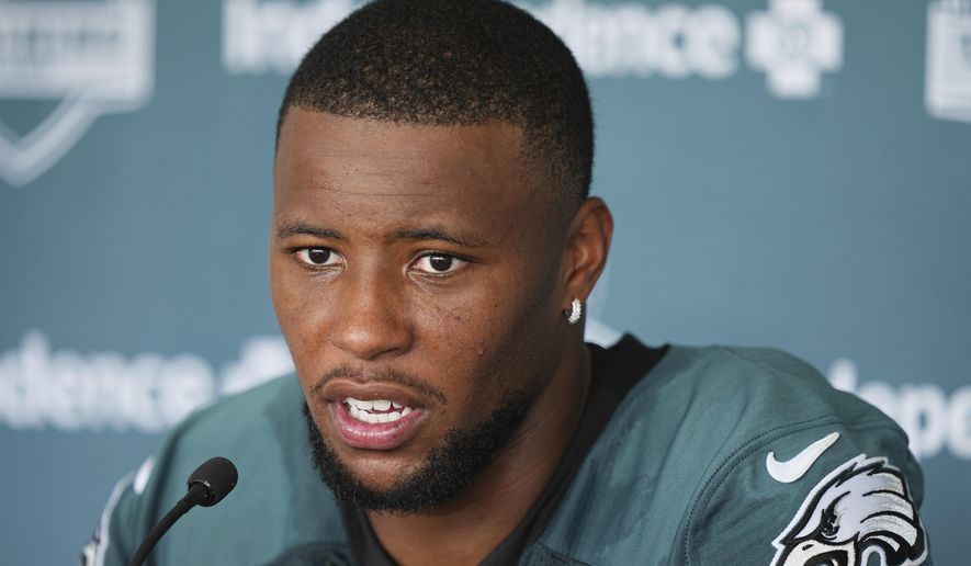 Philadelphia Eagles running back Saquon Barkley speaks during a news conference at the team’s NFL football training camp, Wednesday, July 23, 2025, in Philadelphia. (AP Photo/Matt Rourke)