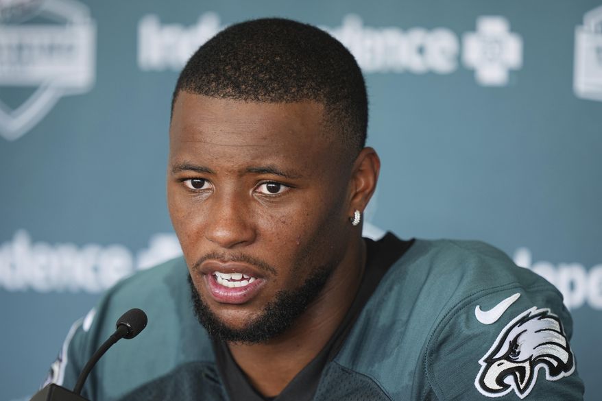 Philadelphia Eagles running back Saquon Barkley speaks during a news conference at the team’s NFL football training camp, Wednesday, July 23, 2025, in Philadelphia. (AP Photo/Matt Rourke)